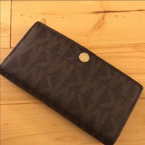 Michael Kora wallet